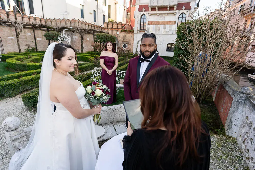 The sister of the bride looks to theml