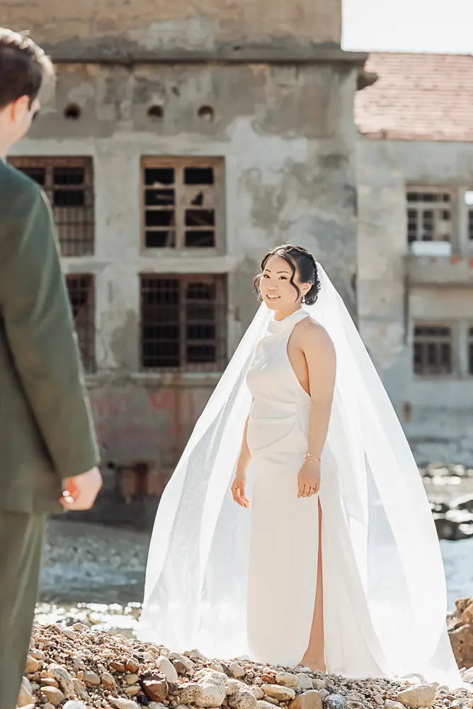 the first look, the bride wait for the groom at the Chania Harbour