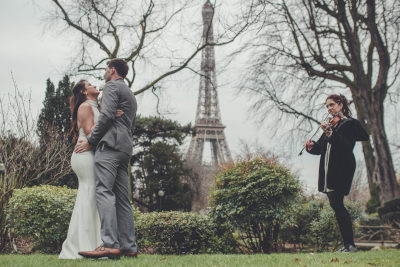 Couple renewing vows at Eiffel Tower in Paris