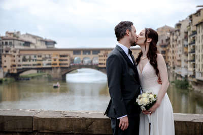 Beautiful vow renewal ceremony in the florence river Beautiful vow renewal ceremony in the florence river