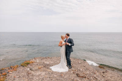 Incredible vow renewal ceremony next to the mediterranean sea in Greece Incredible vow renewal ceremony next to the mediterranean sea in Greece