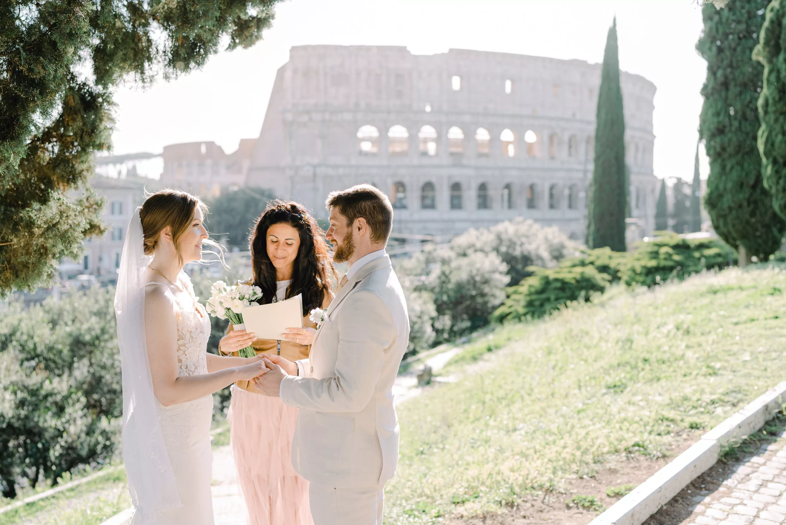 exchanging their vows at colosseum