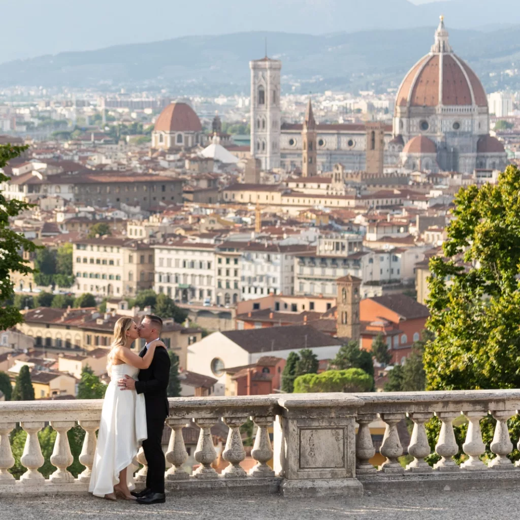 The couple on a balcony with a great view over Rome