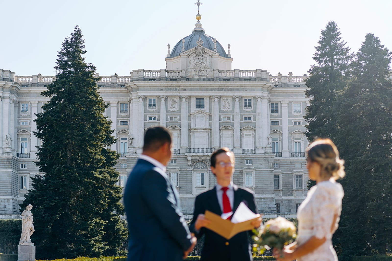 exchanging their vows in Sabatini garden in Madrid