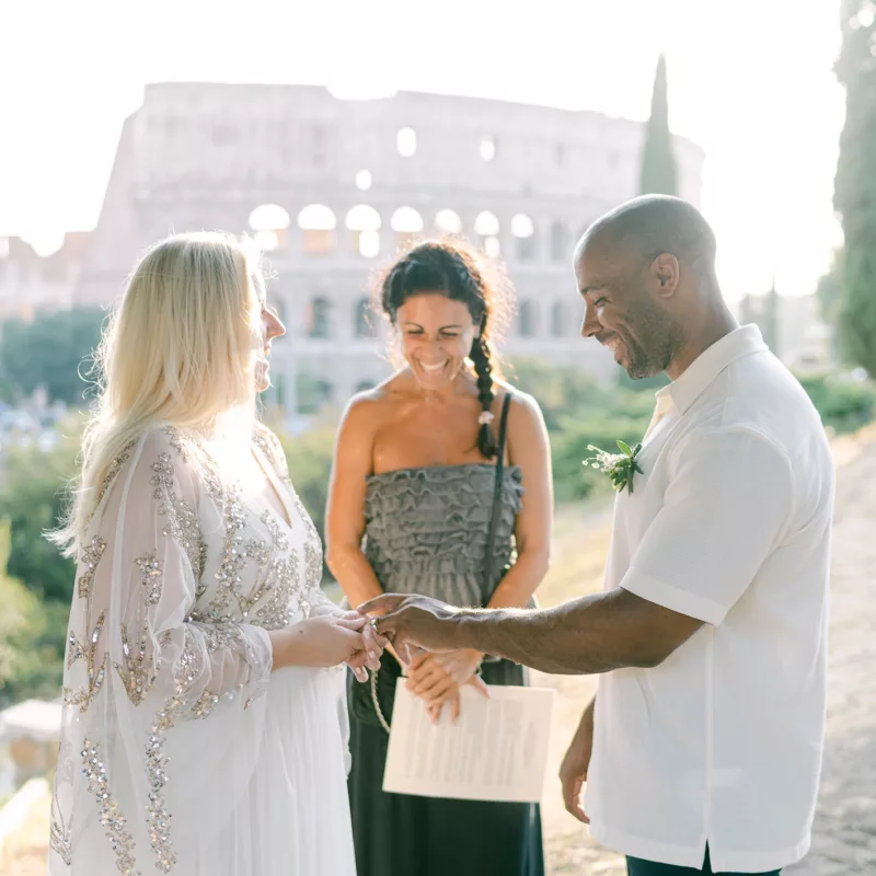 The couple renew their vows at sunrise with the Colosseum as backdrop
