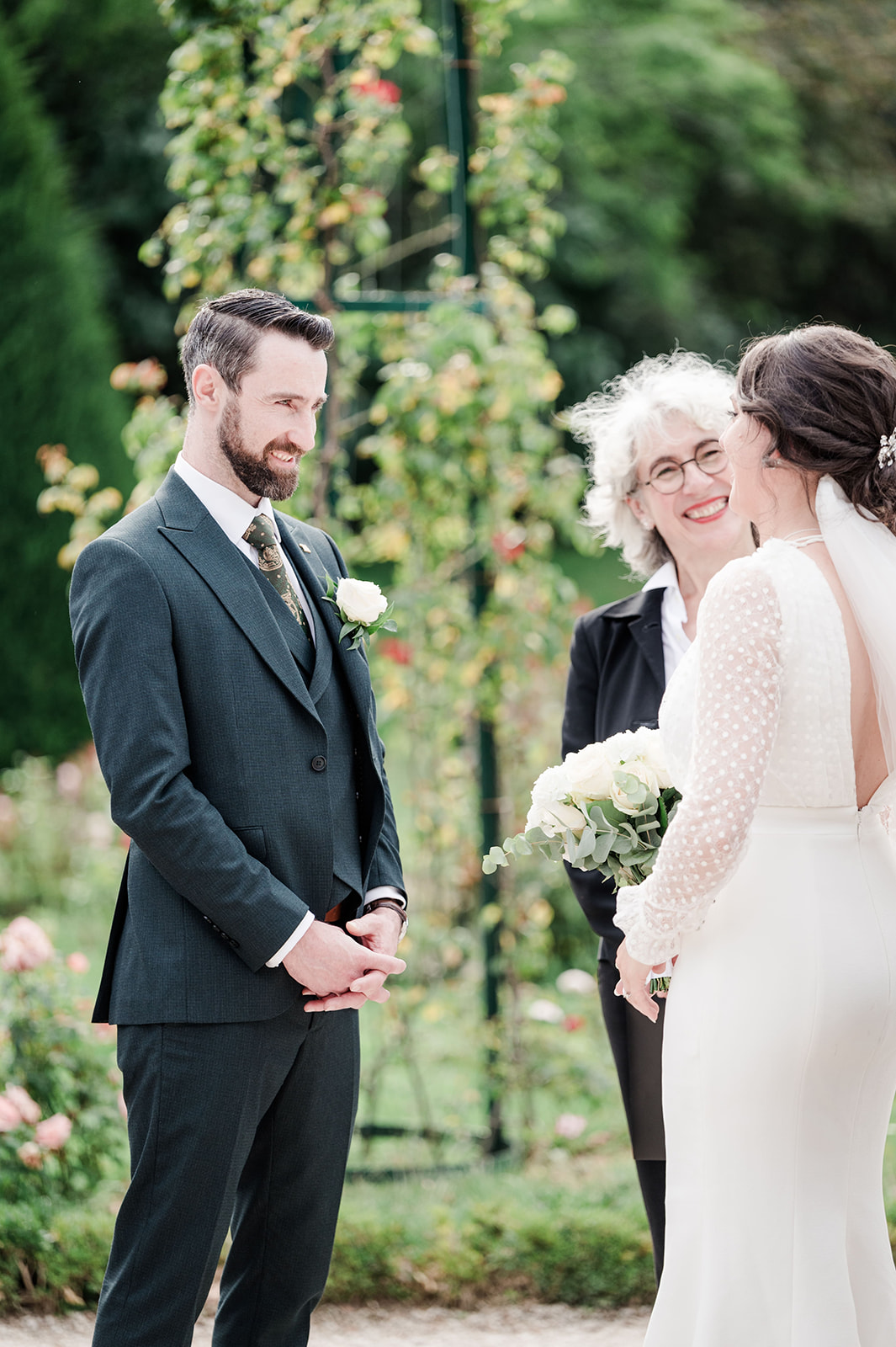 The groom laughs during the Vow exchange