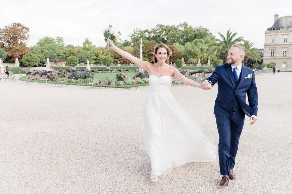 The couple smiling after their Paris wedding at Luxembourg garden