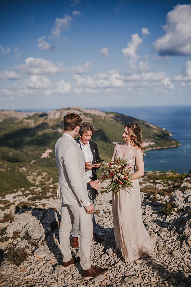 The celebrant speaks about the magnificent setting on the cliff of cabo de formentor