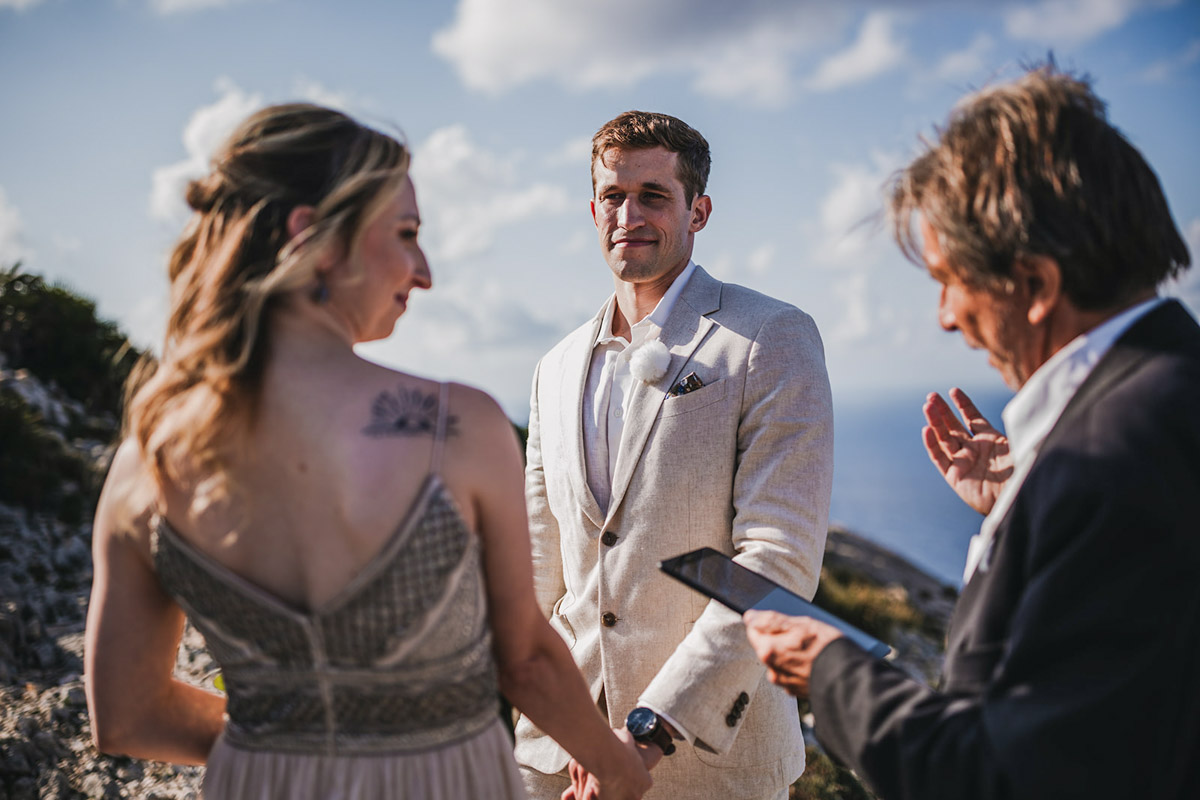 The groom looking at the bride