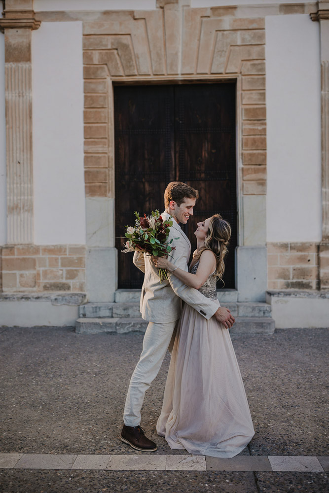 The couple stays connected to each other for the pose