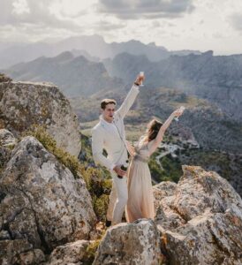Happiness of the couple above the cliff after their elopement