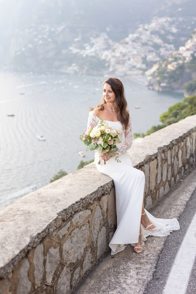 Amazing dress for this gorgeous bride with her bouquet