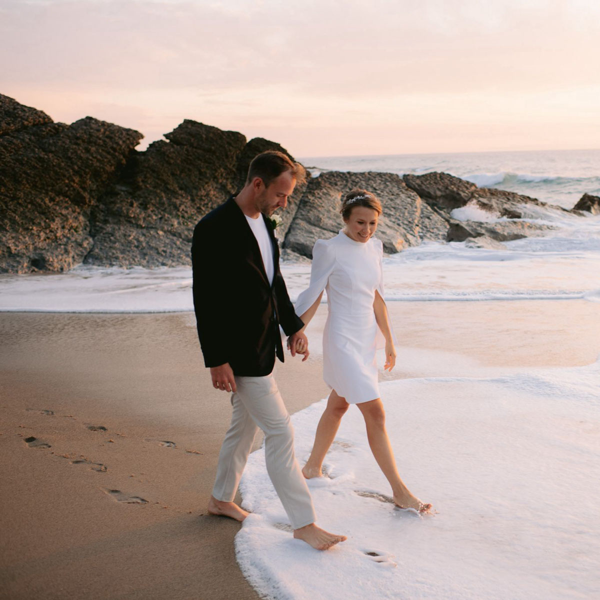 beach walk for their wedding session