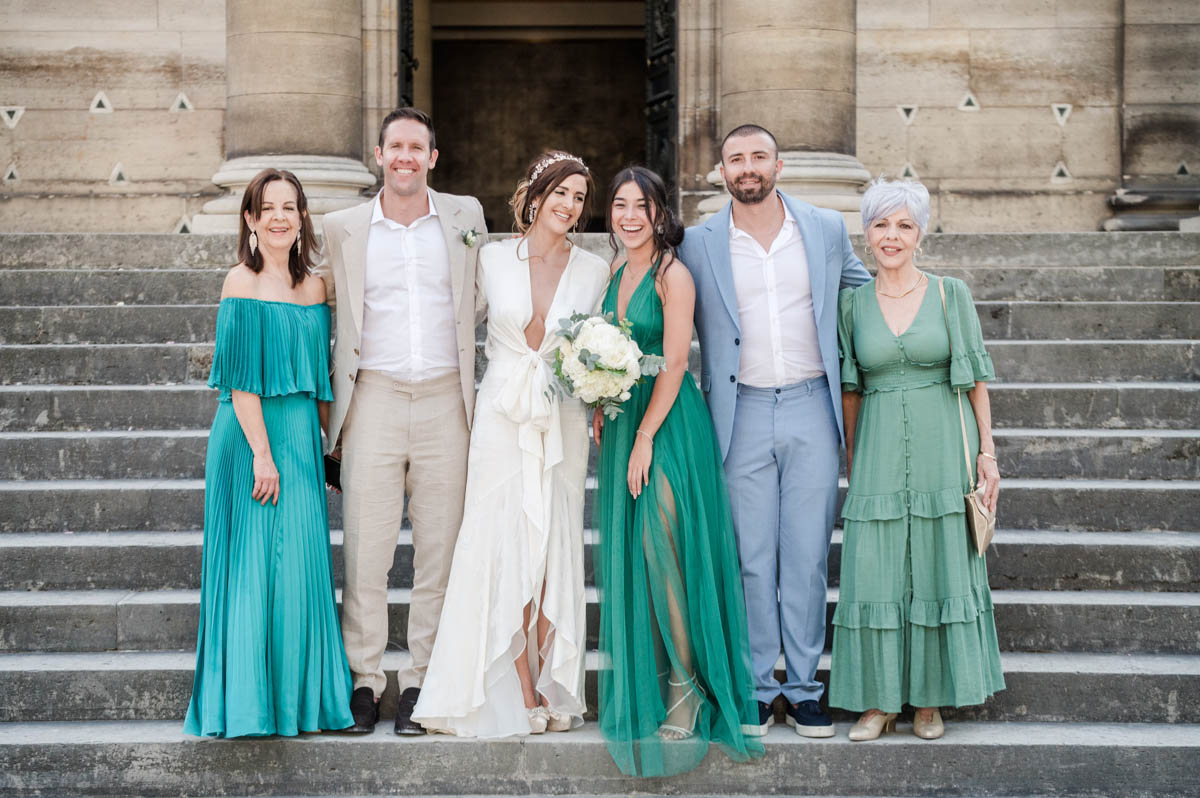 The 2 mothers around the couple for a photo right after the ceremony