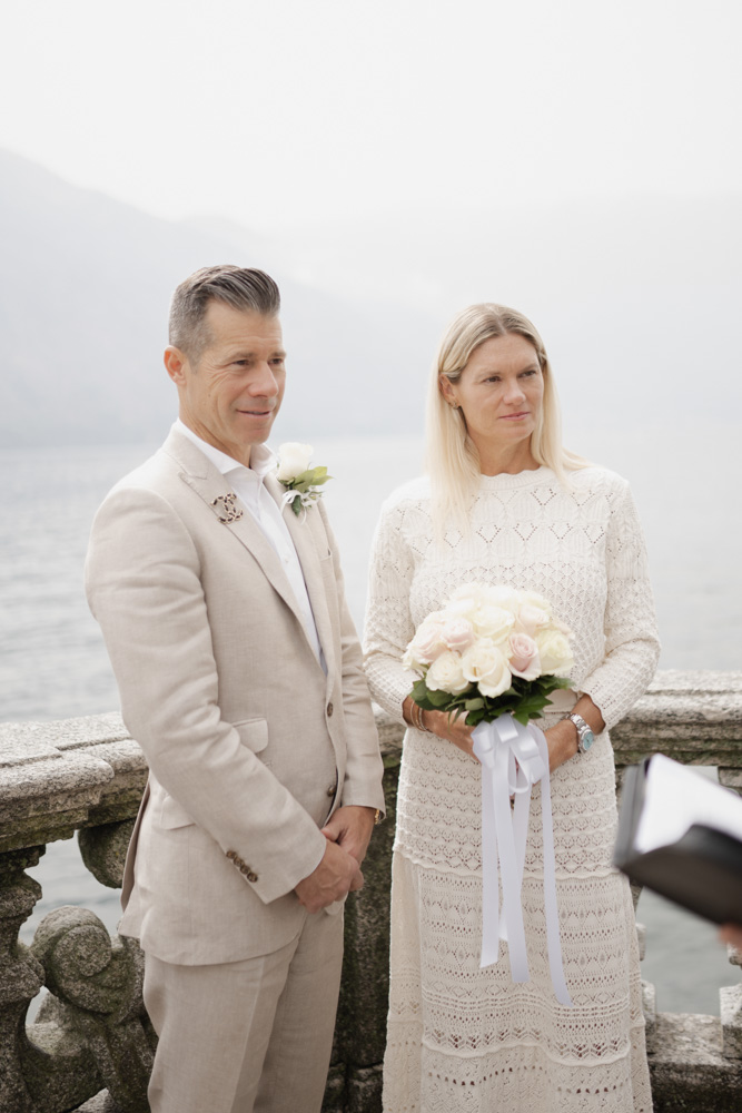 the couple during the ceremony, the celebrant tells their story