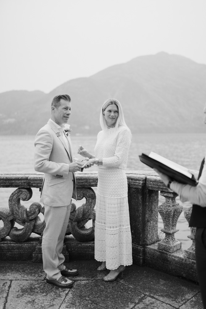 picture in black and white, the couple before the ring exchange