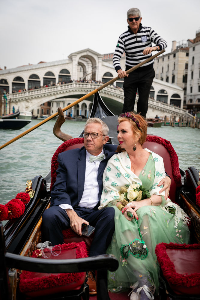 a moment in a gondola for the couple, enjoying the moment