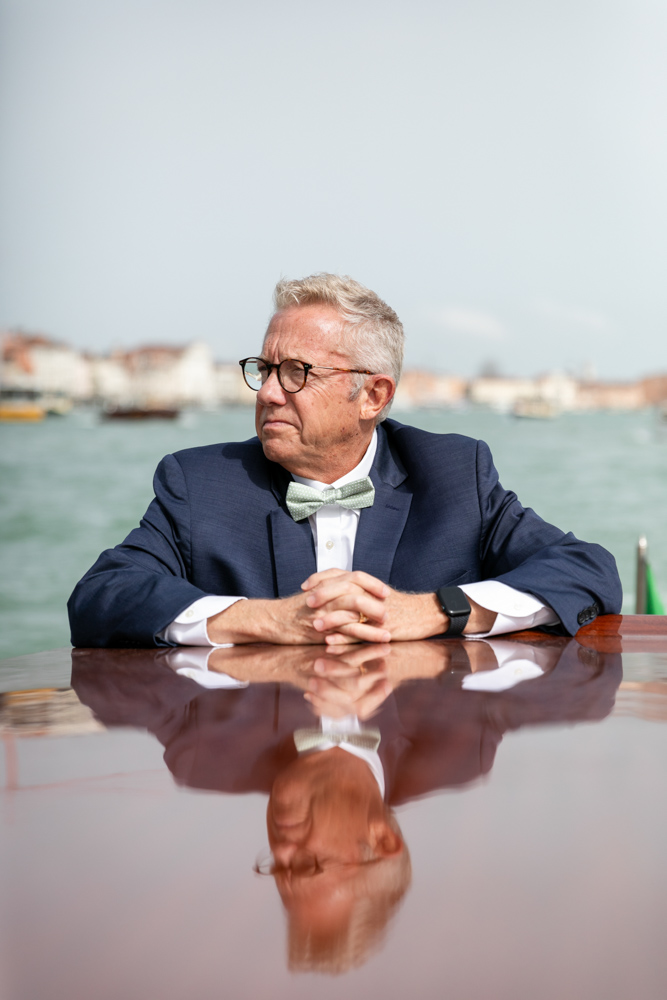 Travis on the boat for a tour in Venice to visit the old places