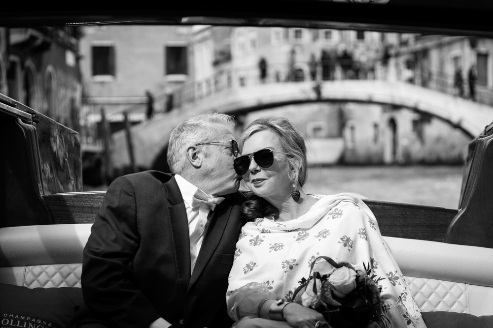 Sunglasses and elegant style, a typical moment and photo like in the 60's movie in Venice
