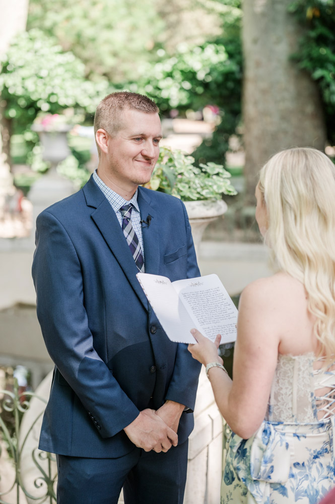 the bride reading her vows during the exchange of vows