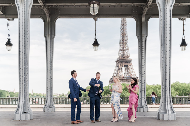 To share a bottle of champagne with friends in front of eiffel tower , what else?