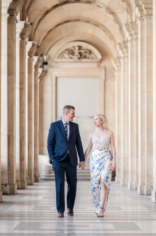The couple walking in the north Aisle of Louvre museum