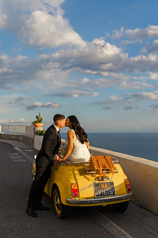 Sunset moment with the blue sky, the couple kisses