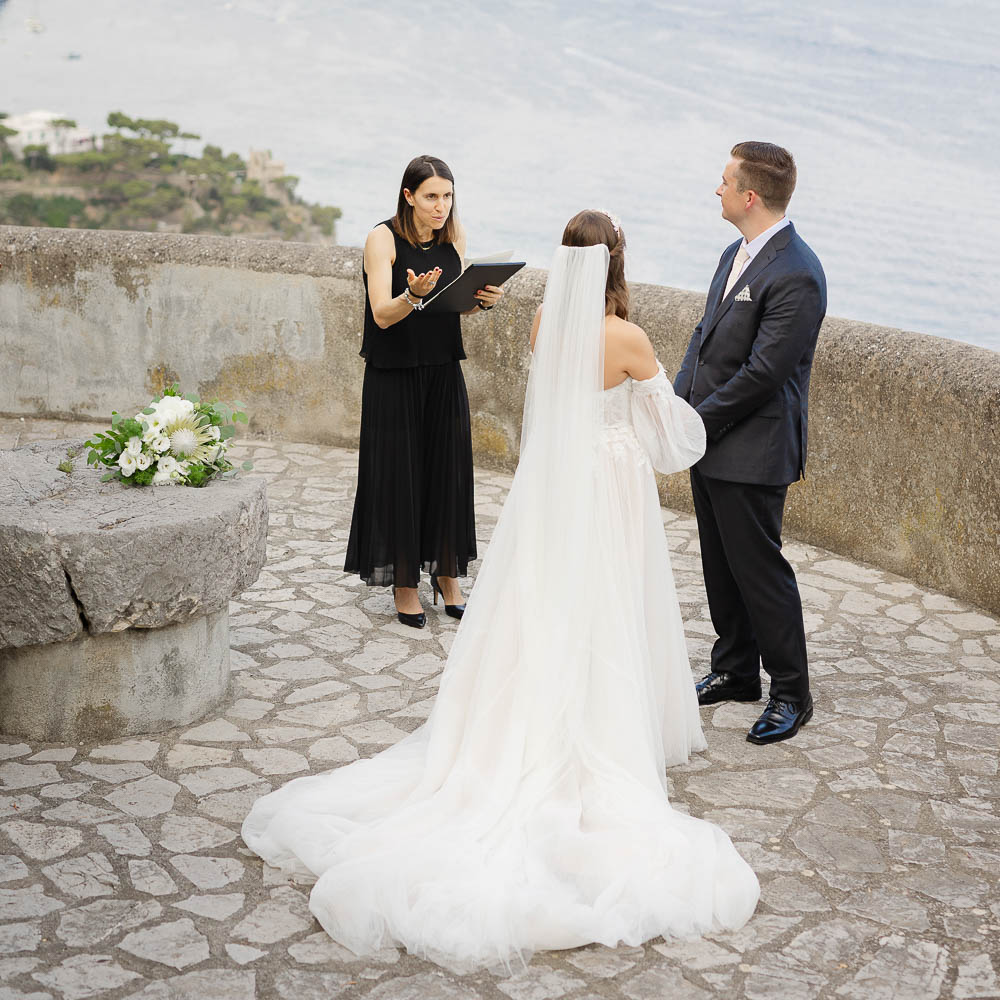 elopement in Cinque terre–029 the couple and the celebrant during a ceremony in Cinque terre