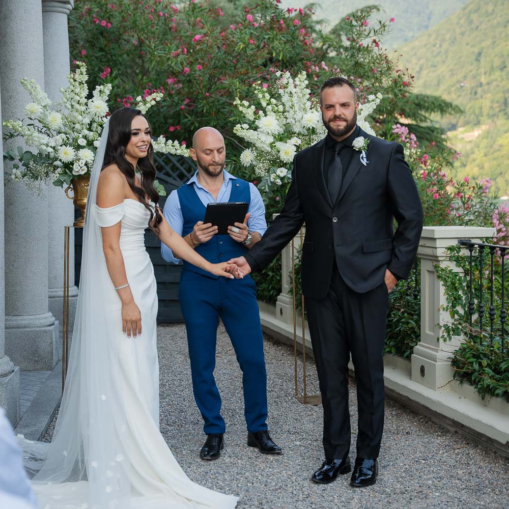 micro wedding on Lake Garda-114-002 The couple an dthe celebrant starting the ceremony of wedding on lake Garda balcony