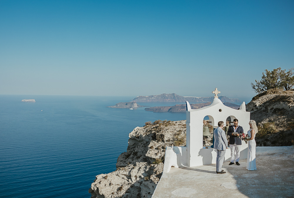 Wedding in winter inSantorini with sun and blue see