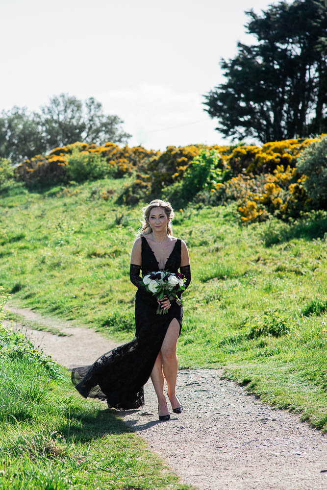 The bride arrives walking on the location for the ceremony