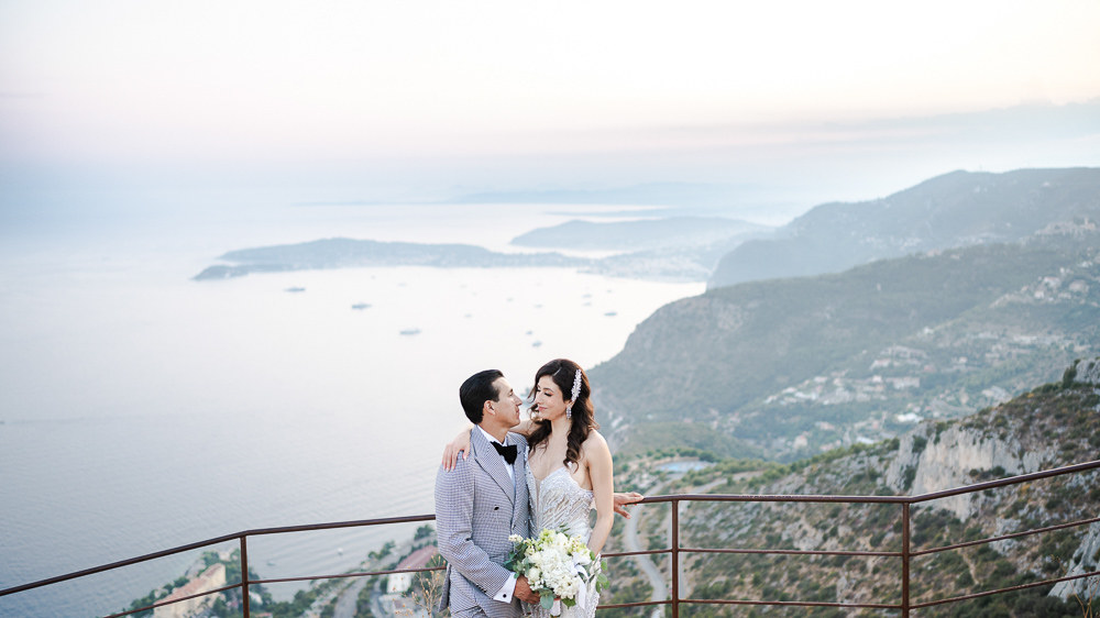 The couple on a famous way for a photo above the Monaco bay