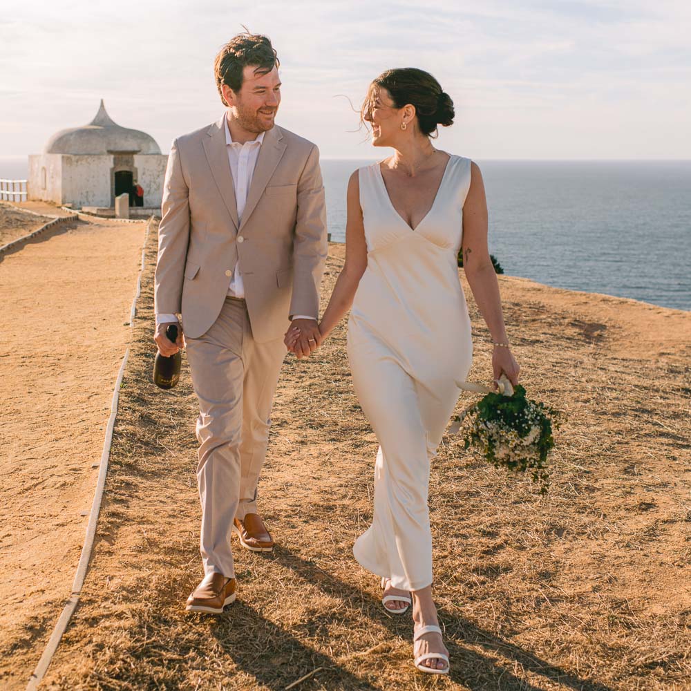Sesimbra Sintra Elopement wedding – 001 The couple before their elopement in Sintra walking in the cliff