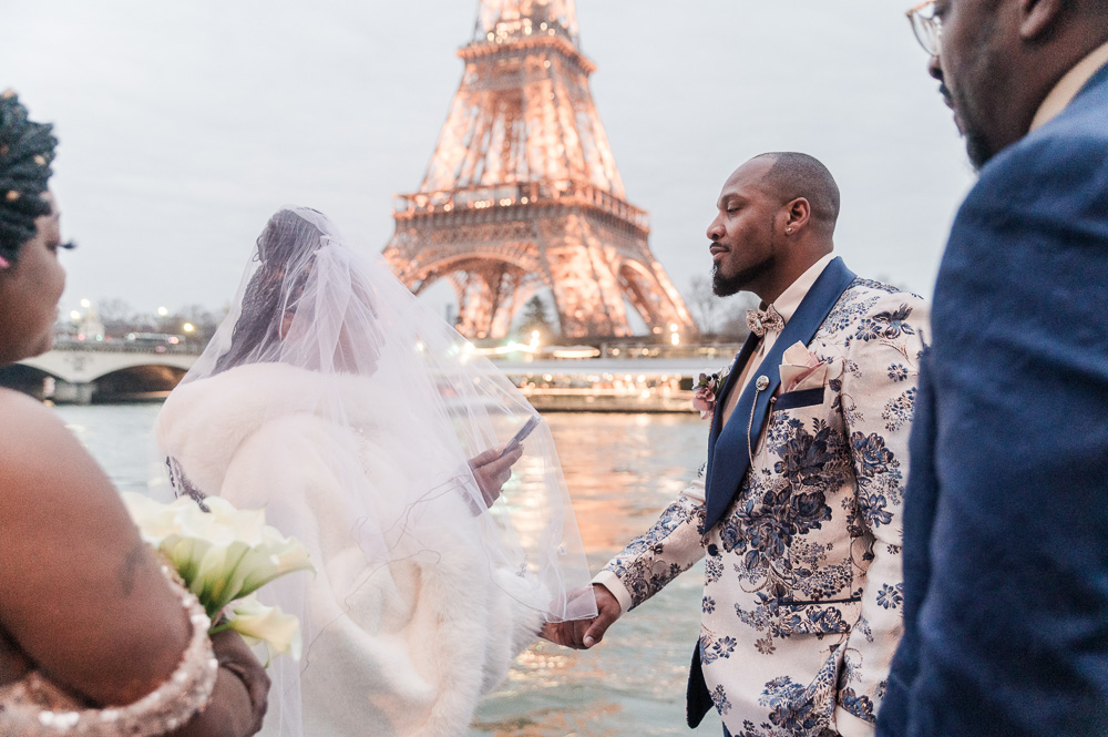 Ceremony at sunset in Winter in Paris, Eiffel tower light are blinking