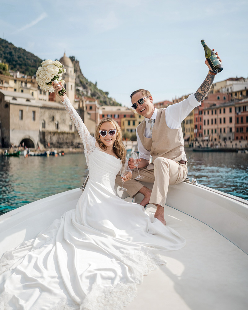 elopement in Cinque Terre-26 The couple on the boat to celebrate their elopement wedding in Cinque terre