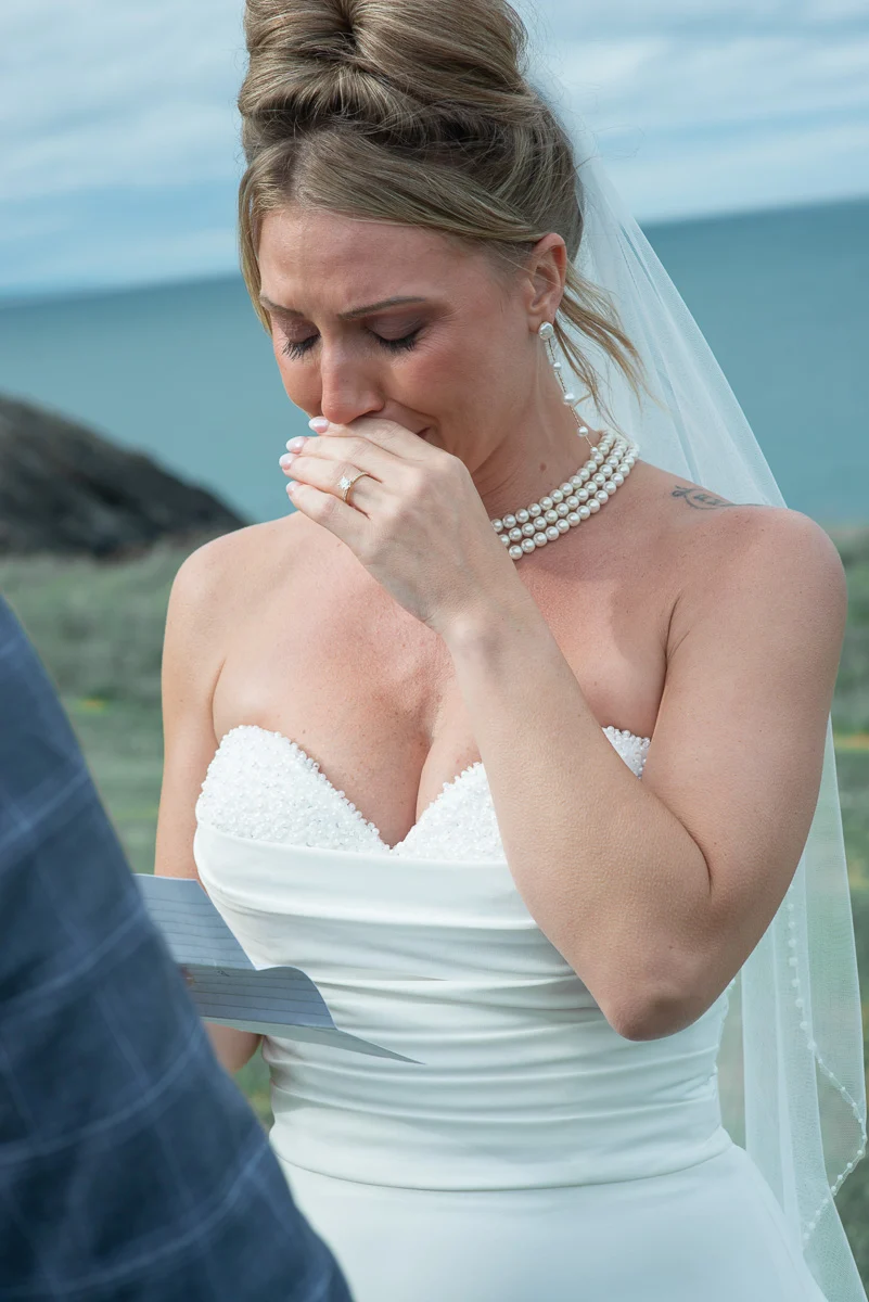 Emotional bride crying during wedding vows Black Castle Ireland