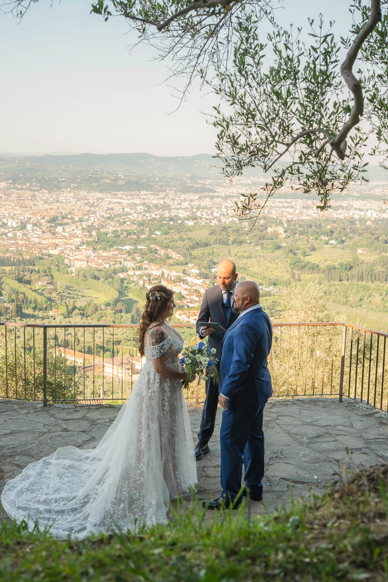 elopment at Fiesole, Tuscany-06 Intimate elopement ceremony on a terrace in Fiesole with a view over Florence — celebrant officiates for couple overlooking Tuscany